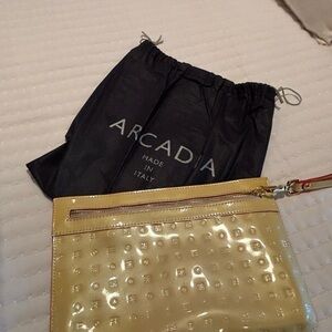 NWT Arcadia patent leather clutch.